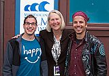 Mendocino Film Festival Vice President Ann Walker joins "Happy" associate producer Omid Heidari and director Roko Belic outside Matheson Hall.