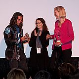Roko Belic is presented the Best Film For Our Future Award by Co-Vice Presidents for Programming Betsy Ford and Ann Walker.