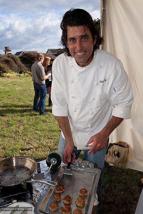 Adam prepares and serves delicious crab cakes.