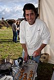 Adam prepares and serves delicious crab cakes.