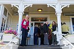 MFF Vice President Ann Walker greets guests arriving for the kickoff party at Mac Callum House.