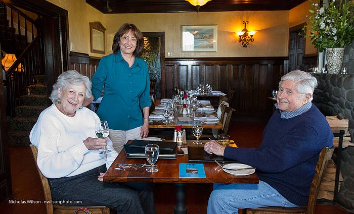 The Kemps order dinner in the Mac Callum House dining room.