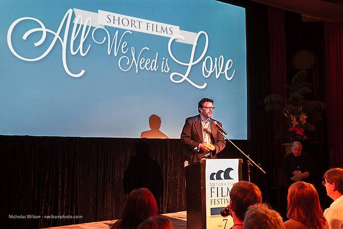 Executive Director Michael Fox at the podium
