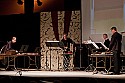 Four percussionists perform Double Music by John Cage and Lou Harrison