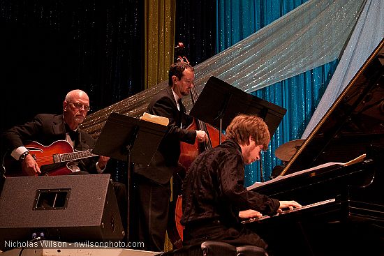 Terry Simcik on guitar, Fred Randolph on bass, and Julian Pollack on piano