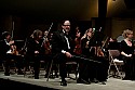 Festival orchestra members receive applause following Brahms' Symphony No. 4.