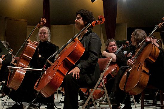 Festival orchestra members receive applause following Brahms' Symphony No. 4.