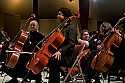 Festival orchestra members receive applause following Brahms' Symphony No. 4.