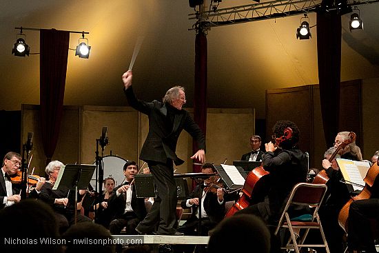 Festival orchestra members receive applause following Brahms' Symphony No. 4.