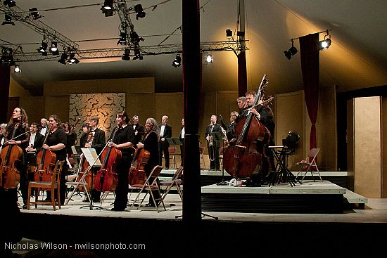 Festival orchestra members receive applause following Brahms' Symphony No. 4.