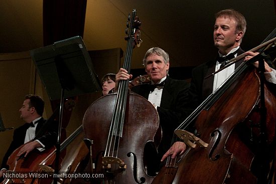 Festival orchestra members receive applause following Brahms' Symphony No. 4.