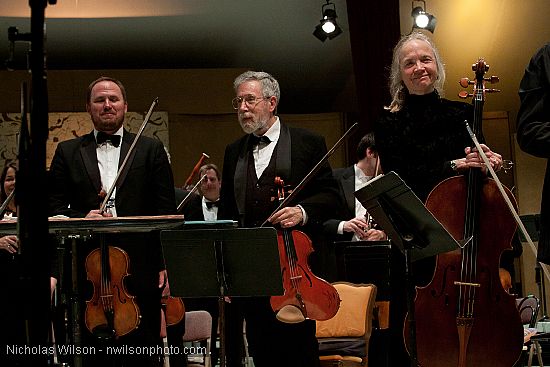 Festival orchestra members receive applause following Brahms' Symphony No. 4.