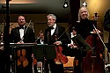 Festival orchestra members receive applause following Brahms' Symphony No. 4.