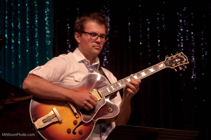 John Storie on guitar with the Julian Waterfall Pollack sextet.