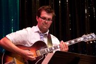 Jazz guitarist John Storie with the Julian Waterfall Pollack quintet.