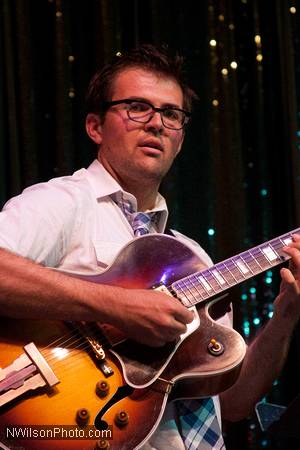 John Storie on guitar with the Julian Waterfall Pollack Sextet.