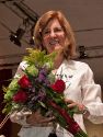 MMF choral director Carolyn Steinbuck with bouquet after the closing concert.