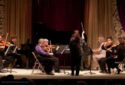 Mary Chun conducts the ensemble for the Reich octet.