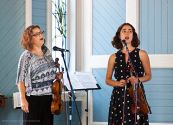 Irene Sazer and Alisa Rose singing a cappella.