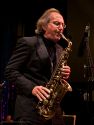 Bandleader Allan Pollack tales an alto sax solo with the MMF Big Band.