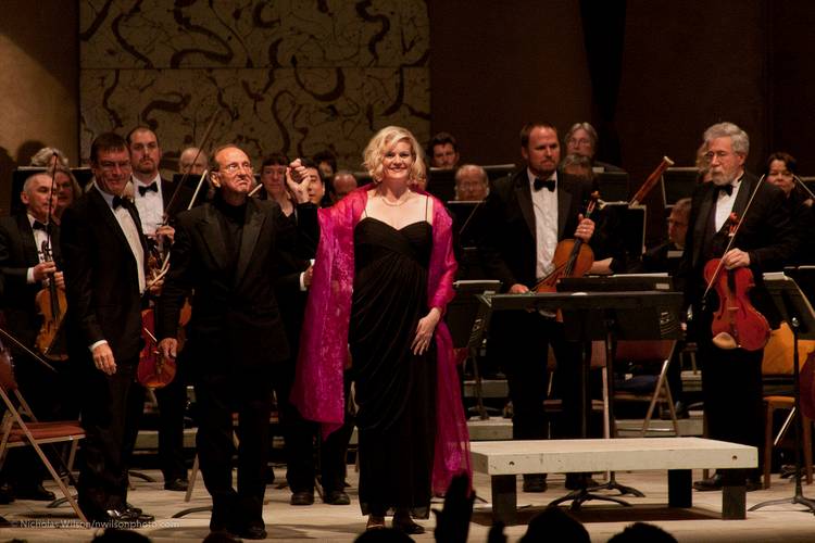 Angela Eden Mosely and Maestro Allan Pollack take a bow with the whole MMF Orchestra.