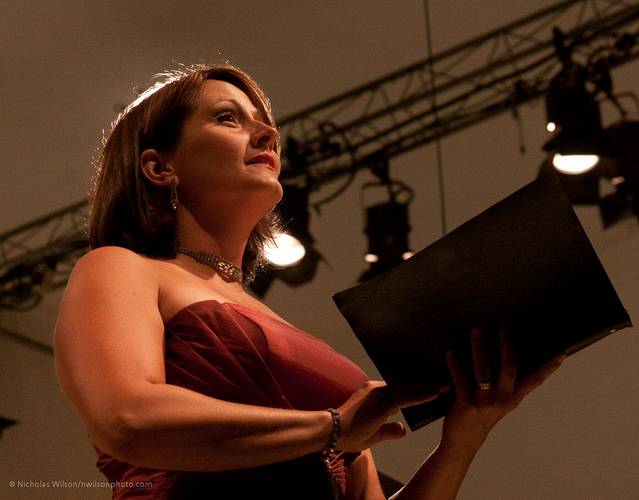 Soprano Carrie Hennessey was featured soloist for the Mahler Song No. 3 to begin the Grand Finale concert of the 25th season.