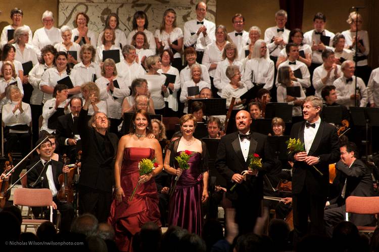 Conductor Allan Pollack joins the vocal soloists, Carrie Hennesey, Erin Neff, David Gustafson and Matthew Miksak to acknowledge the audience's standing ovation.