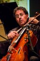 Stephen Harrison, principal cellist of the MFF Orchestra, in performance in Music for a Teahouse