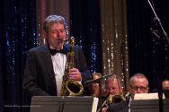 Greg D'Augelli t akes a tnor sax solo with the Big Band