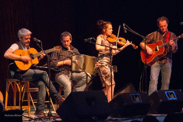 The American Irish band Solas performs in the big tent.