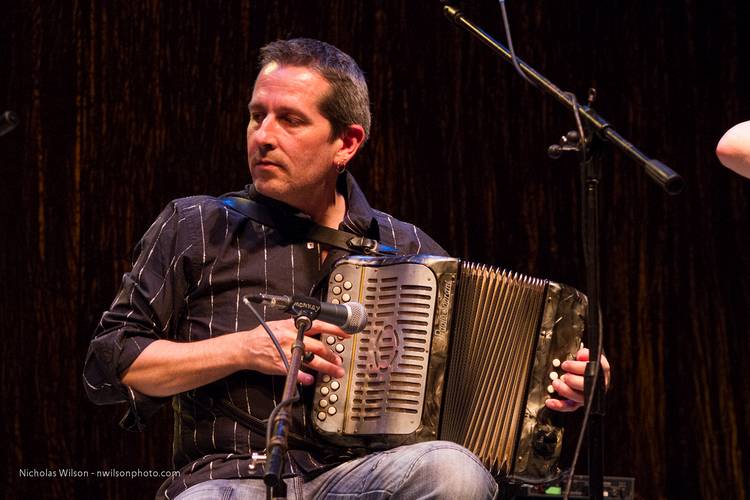 Mick McAuley from Kilkenny plays accordion with Solas.