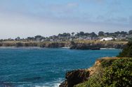 Mendocino, California, occupies a rocky headland jutting into the Pacific Ocean. The giant big top tent houses the Mendocino Music Festival's 850-seat concert hall during July each year.