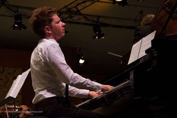 Julian Waterfall Pollack performs his new piano concerto with the MMS Symphony Orchestra conducted by  Maesto Allan Pollack.