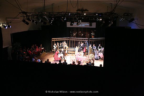 All of these photos were taken from a fixed position in the balcony using a telephoto lens. This photo shows what the eye actually saw during Act II of the final performance. Note the English "supertitles" projected on a screen above the stage.