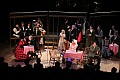The scene at Cafe Momus with all of the principals and some of the chorus in Act II of Opera Fresca's April 2006 production of Puccini's La Boheme.