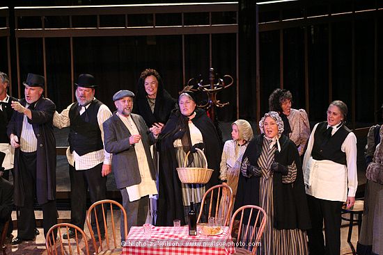 Chorus members in Opera Fresca's April 2006 production of Puccini's La Boheme.