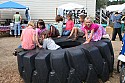 Children play on a giant tire at CasparFest 2007