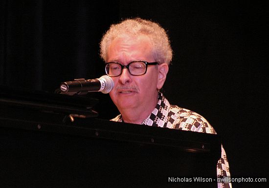 Max Forseter at the piano in performance with Bill Irwin at Cotton Auditorium, Fort Bragg CA