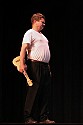 Patrick Irwin with ukulele in performance with brother Bill at Cotton Auditorium, Fort Bragg CA