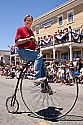 Tony Graham rides his penny farthing bicycle.