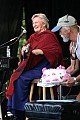 Rosalie Sorrels birthday cake presented by Che Greenwood, stage manager