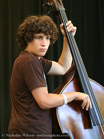 Sam Grisman  plays bass with the David Grisman Bluegrass Experience