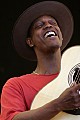 Eric Bibb on the main stage in his set with the Campbell Brothers